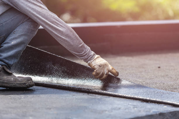 Professional Exterior Waterproofing technician working in Leon, KS